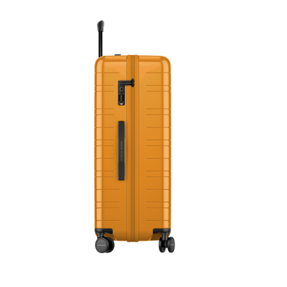 Koffer Essential Glossy Bright Amber Seitenansicht - Hartschale Polycarbonat Leicht Robust - Horizn Studios