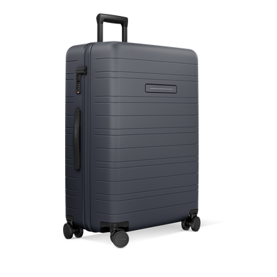 H7 GO Reisegepäck groß Dark Slate - Schrägansicht mit 360°-Rollen