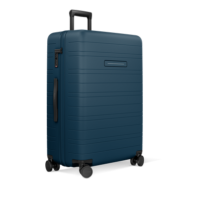 H7 GO Reisegepäck groß River Blue - Schrägansicht mit 360°-Rollen